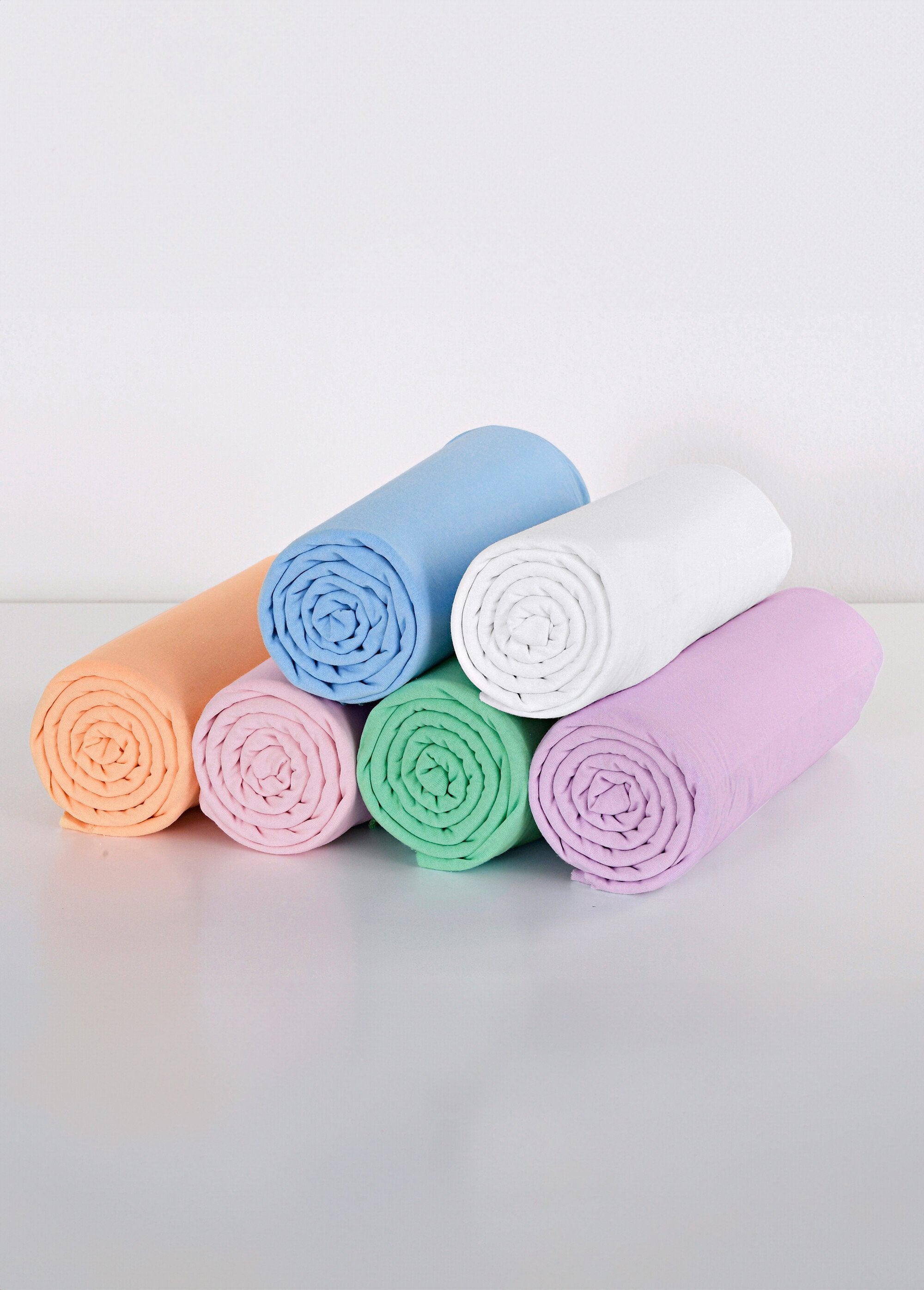 Sábana_bajera_de_punto_de_algodón_liso_Rosa_DE1_slim