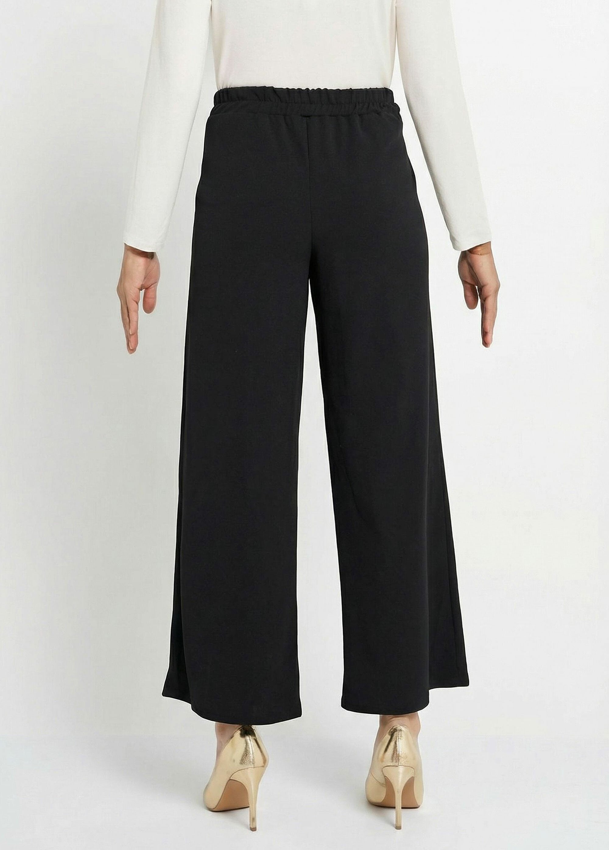 Pantalones_de_punto_de_pierna_ancha_con_elegantes_detalles_metálicos_Negro_DO1_slim