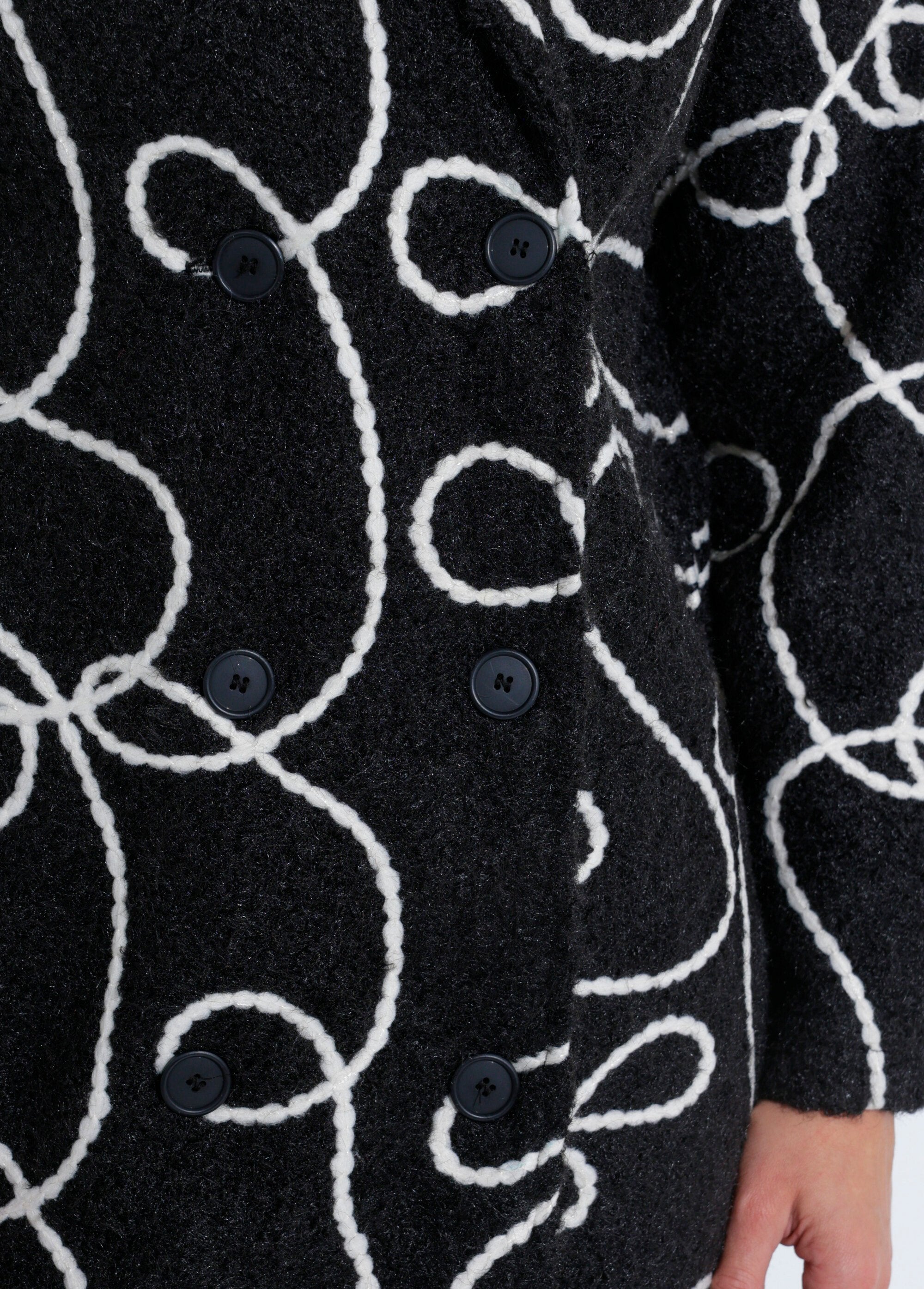 Abrigo_largo_y_elegante_de_lana_hervida_estilo_guisante_Negro_DE3_slim