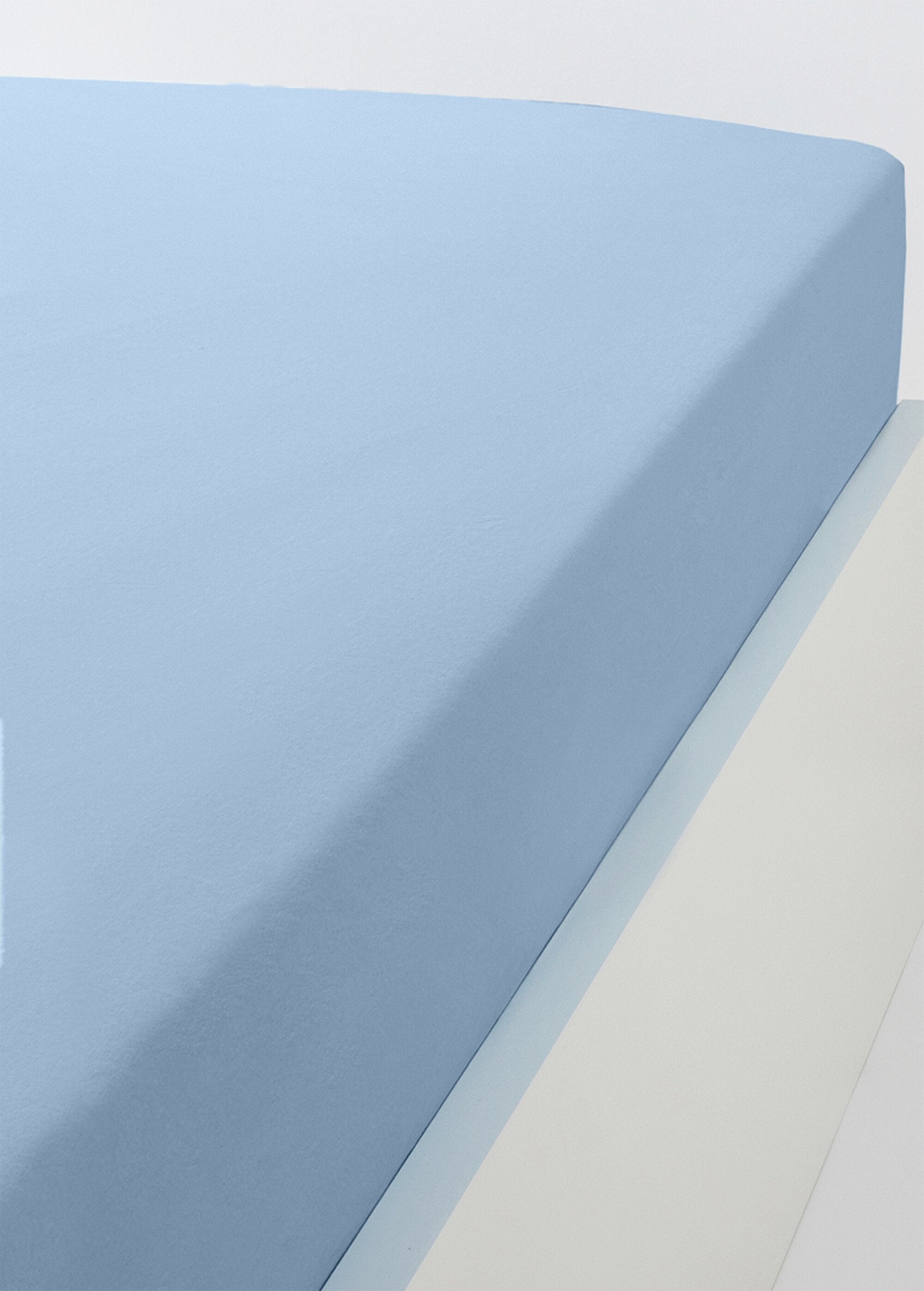 Sábana_bajera_de_punto_de_algodón_liso_Azul_FA1_slim