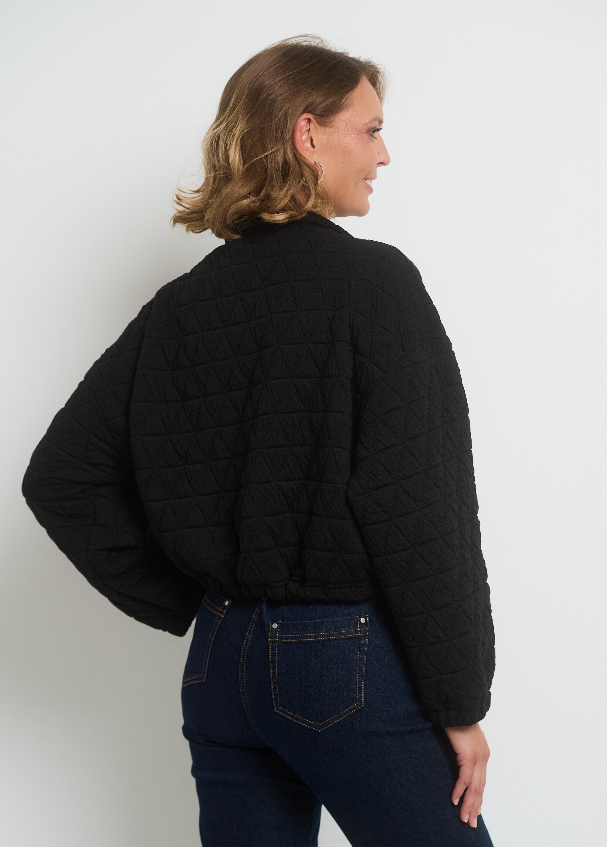 Chaqueta_acolchada_con_cremallera_y_cuello_alto_Negro_DO2_slim